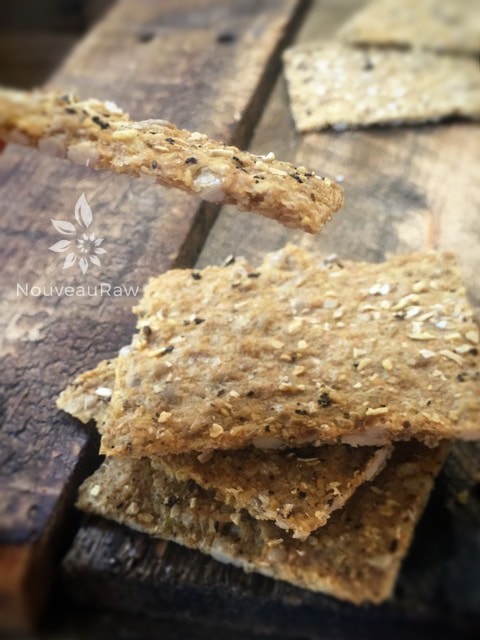 showing how thin the fresh crisp gluten free Onion Bread Crackers are