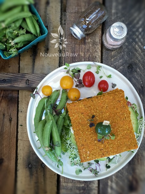 Tamari-Carrot Bread sandwich created with the bread served with snap peas