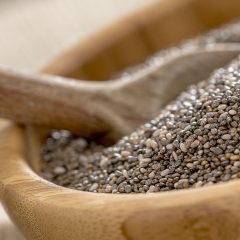 chia seeds close up in wooden bowl
