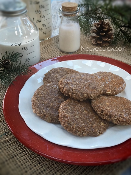  a Christmas display of raw vegan Frosted Gingerbread Cookie served with almond milk