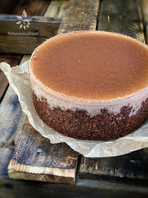 I just removed the cheesecake from the freezer. You can see that the top naturally darkened. If you wish, you can proceed with decorating with Chocolate Ganache frosting.