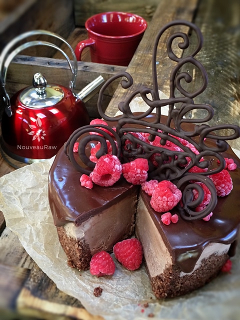 raw vegan gluten-free Chocolate Mocha Cheesecake served with hot tea