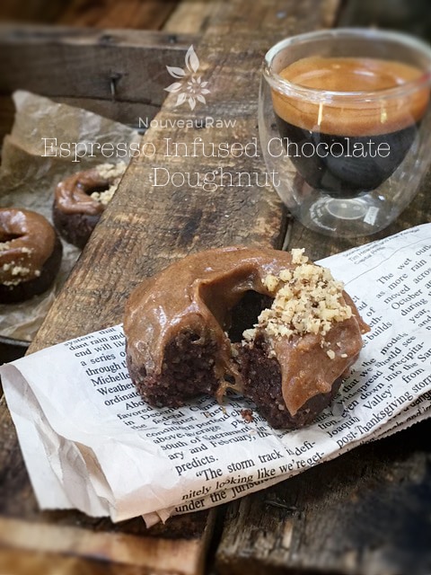 raw vegan gluten free Espresso Infused Chocolate Doughnut served with coffee and newspaper
