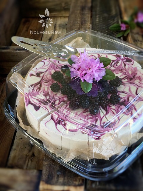 the raw vegan blackberry lemon cheesecake sealed in a delivery box