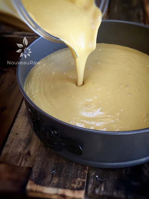 pouring the Pumpkin Spice Cheesecake filling to the pan