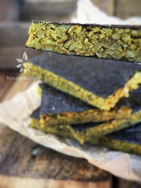 showing the thick crisp side view of a raw gluten free Thai Nori Crackers 