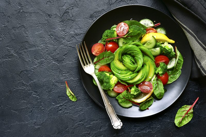 avocado-salad on a slate background