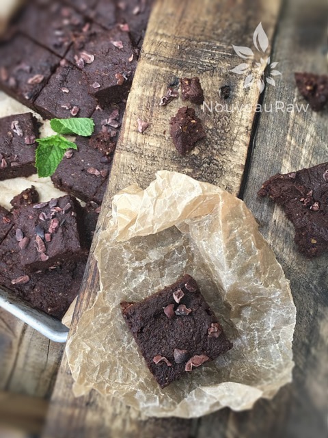 Raw Gluten-Free Espresso' My Mint Cacao Brownies with Fresh Mint on Wood Table