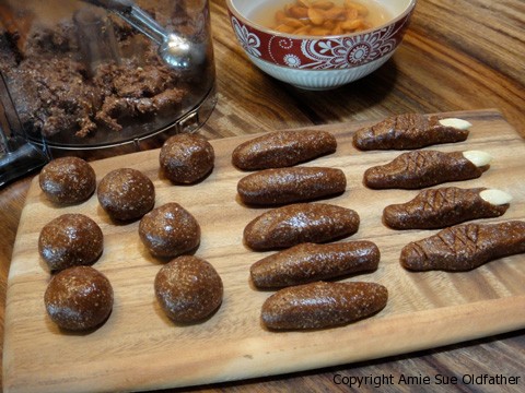showing you how to shape the raw vegan gluten free Witches' Finger Cookies