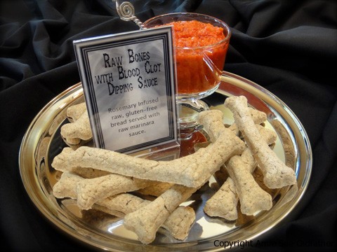 a silver plate of raw vegan Rosemary Bread "Bones" - Halloween