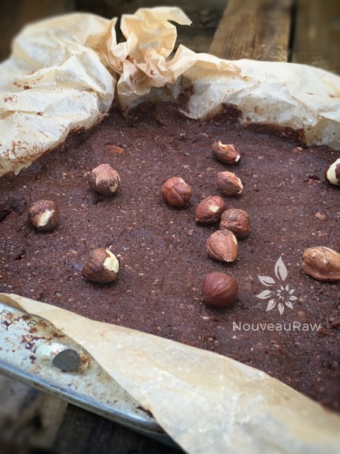 Raw Gluten-Free Hazelnut & Coconut Chai Brownie dough on a Tray
