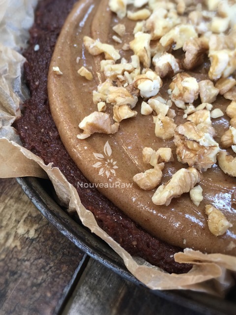 close up delicious, nutritious raw vegan gluten free Chocolate Banana Fudge Cake with Caramel Frosting 