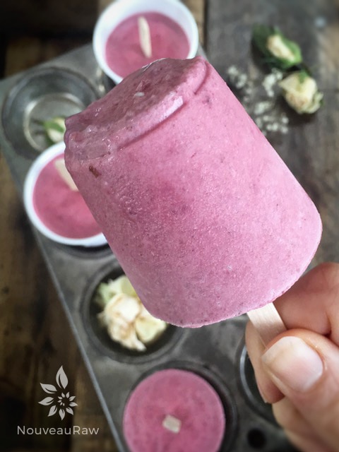 a close up of raw vegan Chia Cherry Yogurt Dixie Pops displayed in an antique muffin tin