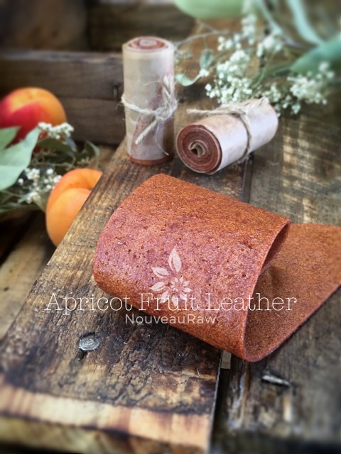 apricot fruit leather displayed on barn wood