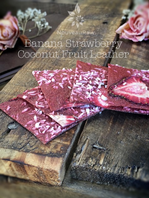 Banana Strawberry Coconut Fruit Leather fanned out on a piece of old wood