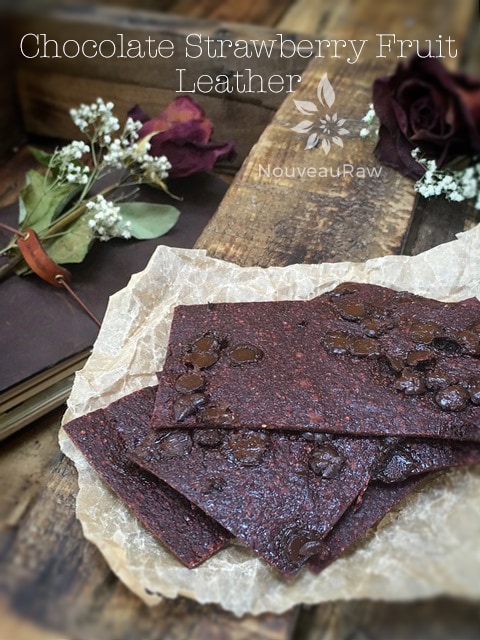 raw Chocolate Strawberry Fruit Leather displayed on a wooden table
