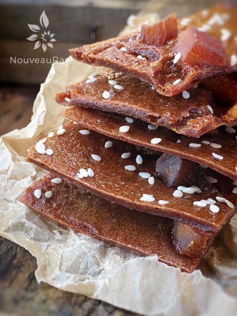 a stack of apricot fruit leather with sesame seeds