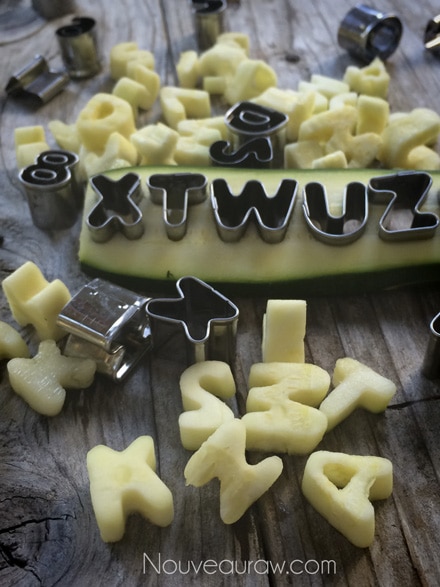 creating zucchini letters with cookie cutters