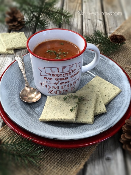 raw vegan gluten free Club Crackers displayed with a mug of soup