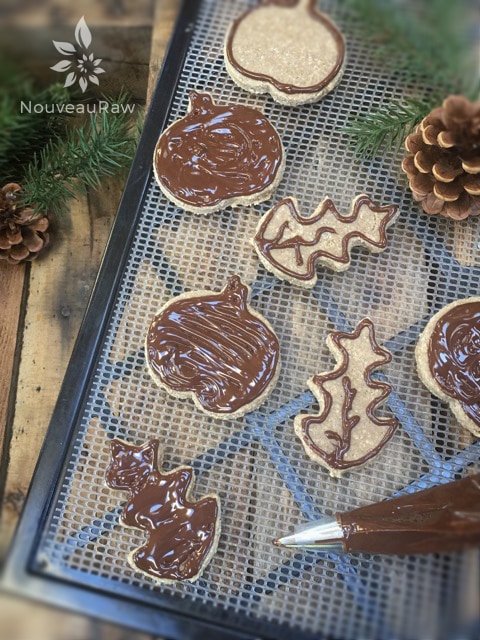a display of raw Ginger Pumpkin Spiced Sugar Cookies with chocolate on top