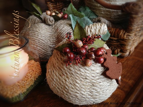 Cinnamon Ornaments attached to twine wrapped pumpkins