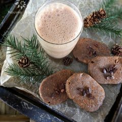 over view of a almond chocolate coffee biscuit cookies displayed on an antique cookie tray