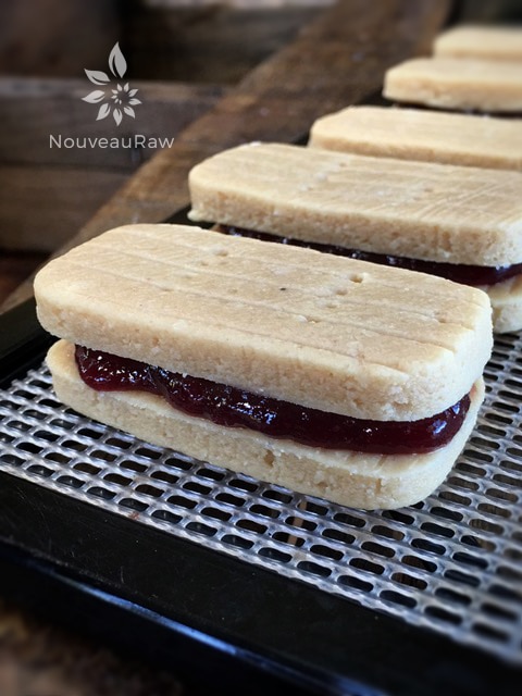 creating sandwiches out of the dough when creating raw vegan Buttery Shortbread Tea Cookie with Sour Cherry Jam