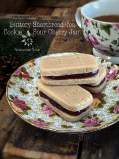 raw vegan Buttery Shortbread Tea Cookie with Sour Cherry Jam displayed on fine china