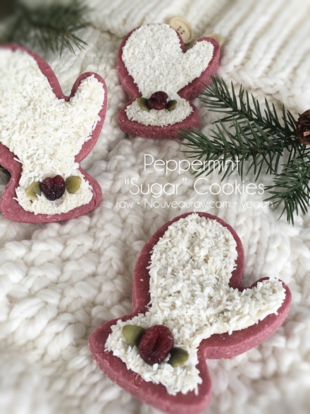 raw vegan Peppermint "Sugar” Cookies shaped into mittens