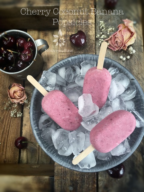 raw vegan Cherry Coconut Banana Popsicles served in a tin of ice cubes