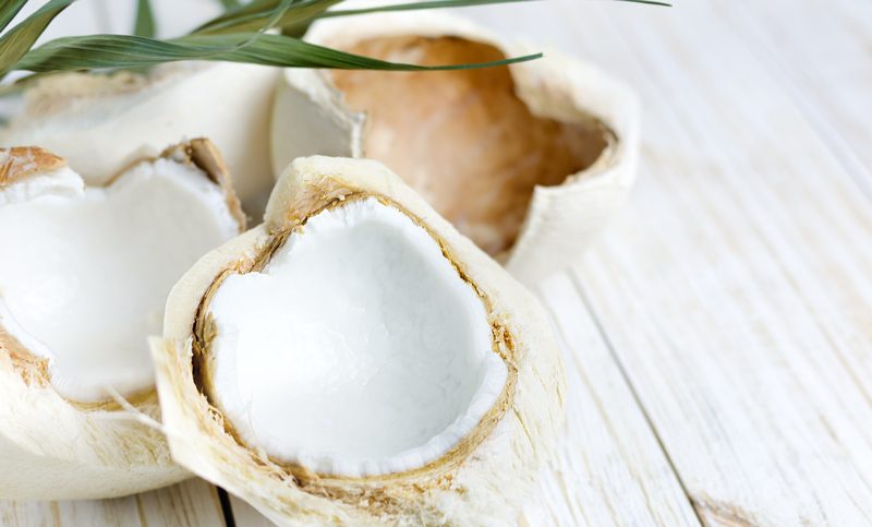 young-Thai-coconut-on-white-table