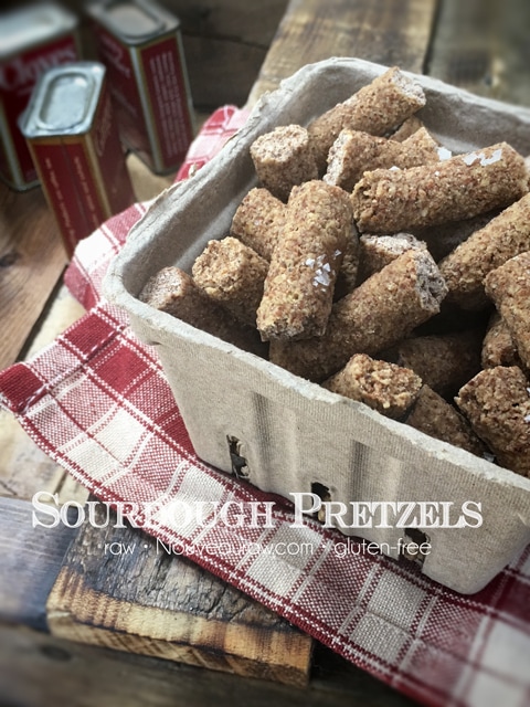 raw vegan cultured Sourdough Pretzels displayed in a berry container