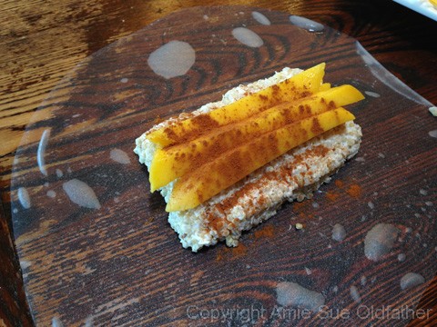 adding the mango the raw vegan Coconut Mango Spring Rolls with Sticky Quinoa "Rice" 