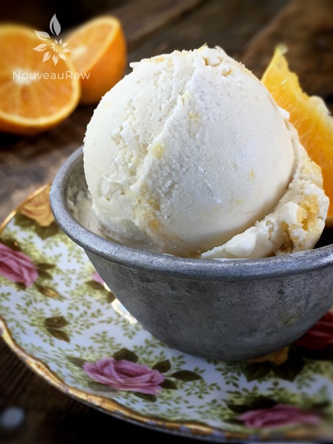 a close up of raw vegan Honey Page Mandarin Ice Cream served in china dishes