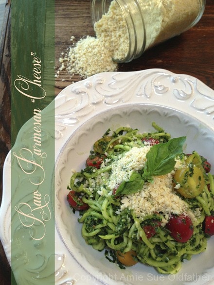 raw vegan Almond Parmesan sprinkled on a raw noodle dish