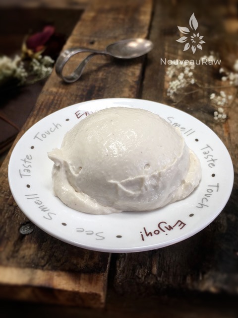 velvety creamy raw vegan Creamy Vanilla Bean Frozen Custard displayed on barn wood