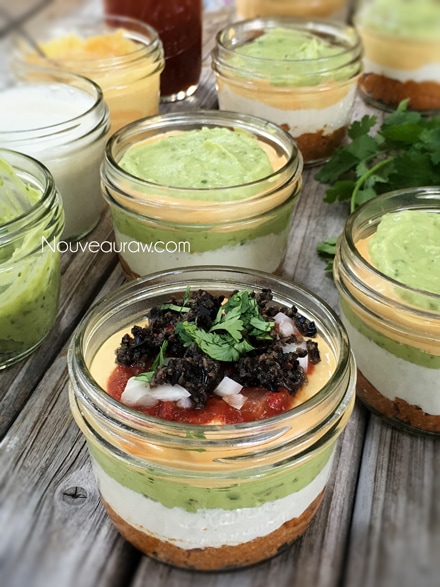 serving raw vegan Five Layer Mexican Fiesta Dip individual servings for portion control