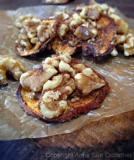 raw vegan gluten free Maple and Walnut Peach Pie Slices displayed on barn wood