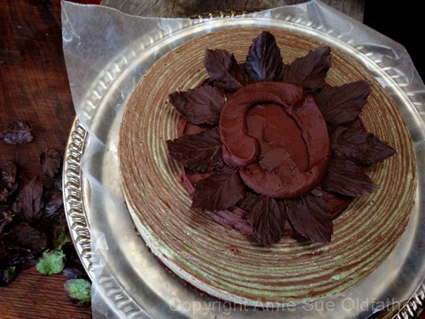  Pipe a little ring of ganache over the ends of the leaves