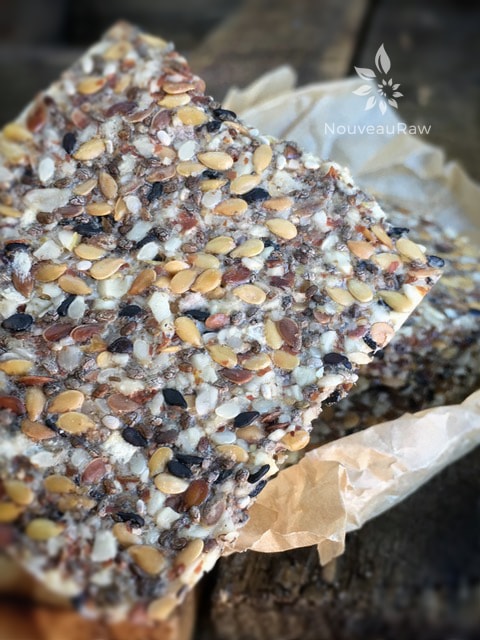 a close up photo of crunchy seedy gluten-free Sesame Onion Almond Flax Crackers