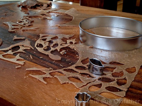 cutting out small leaves for crust decorating