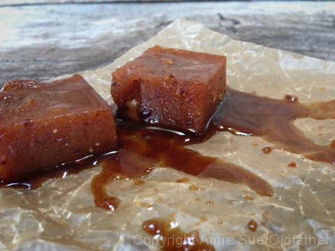 Peach and Pecan Turkish Delights displayed on wax paper with a sweet syrup