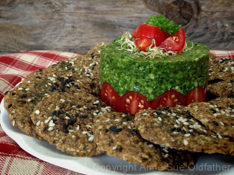 Raw-Cilantro-and-Spinach-Cashew-Pesto served with raw onion crackers