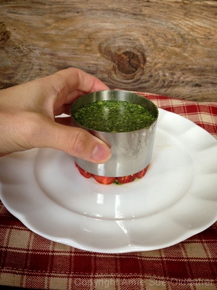 slowly removing the molding ring from the Raw-Cilantro-and-Spinach-Cashew-Pesto