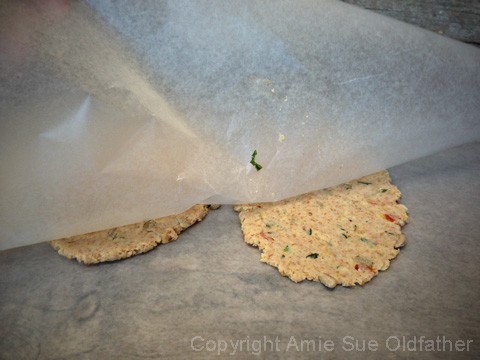 Raw Sun Dried Basil Crisp Flatbread Dough Between Wax Papers
