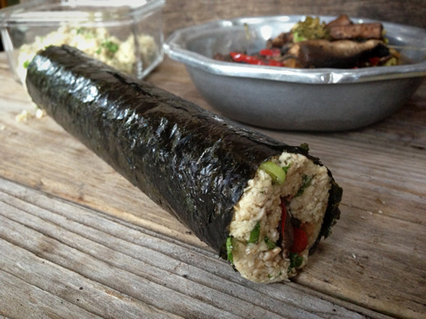 rolling the filling in a nori roll