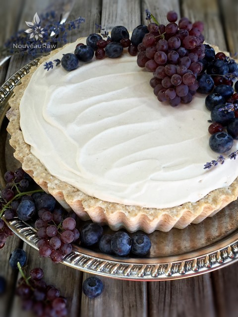 a close up of the raw vegan English Lavender and Blueberry Cheesecake