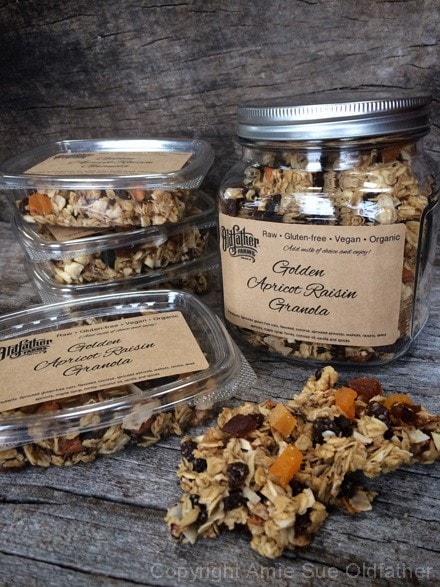 raw gluten-free Golden Apricot Raisin Granola displayed in gift giving containers
