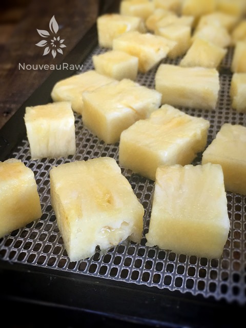 large pineapple chunks waiting to be dehydrated