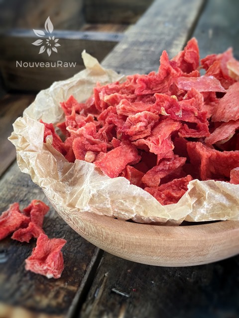dehydrated-watermelon-bites displayed in a wooden bowl